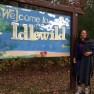 Carolyn Finney by Idlewild sign