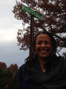 Carolyn Finney with Righteous Road sign